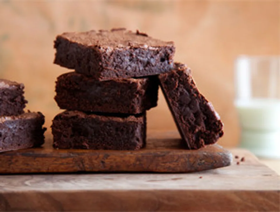 Brownies and blondies arranged on a platter